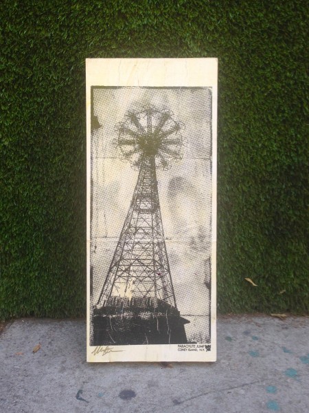 electric tower artwork on wood